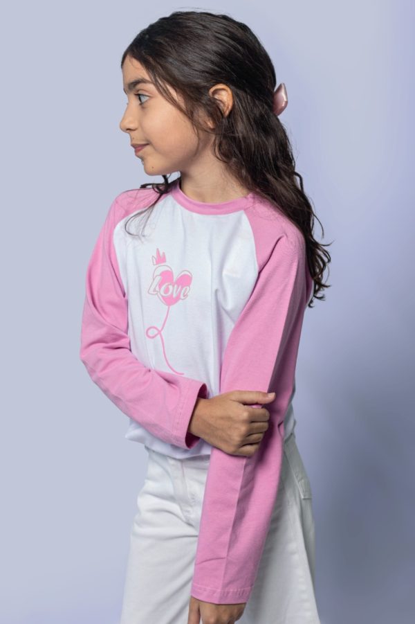 Remera de manga niña rosa y blanco